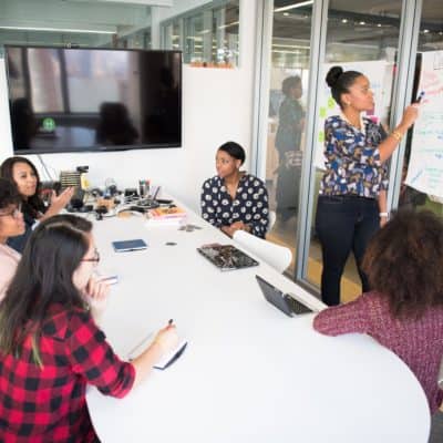 six-woman-standing-and-siting-inside-the-room-1181622